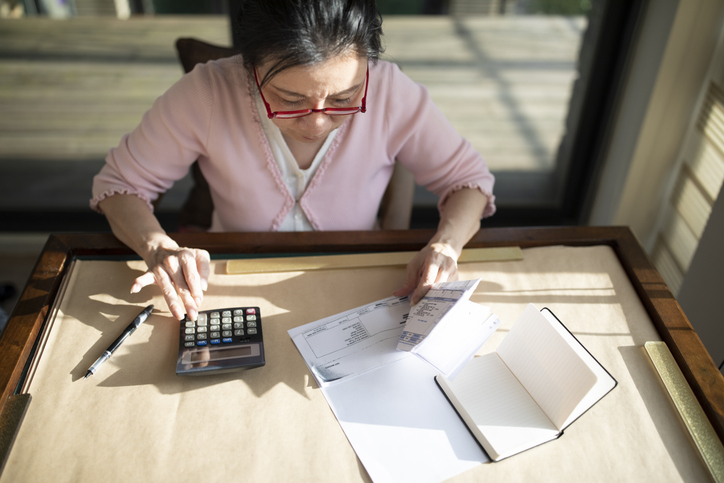 A senior reviewing her retirement benefits. 